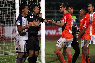 Referee Muhd Taqi tried to defuse a tense moment