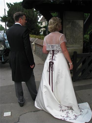 An absolutely stunning Rosetta Nicolini wedding dress ivory in colour with