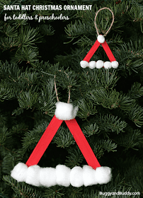 easy to make toddler craft santa hat christmas ornament using popsicle sticks, cotton balls, red paint and glue