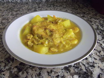 Hake stew with prawns and clams