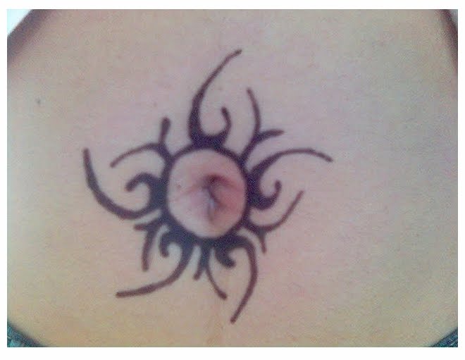 My oficemate's belly button tattoo she told me it didn't hurt when she 