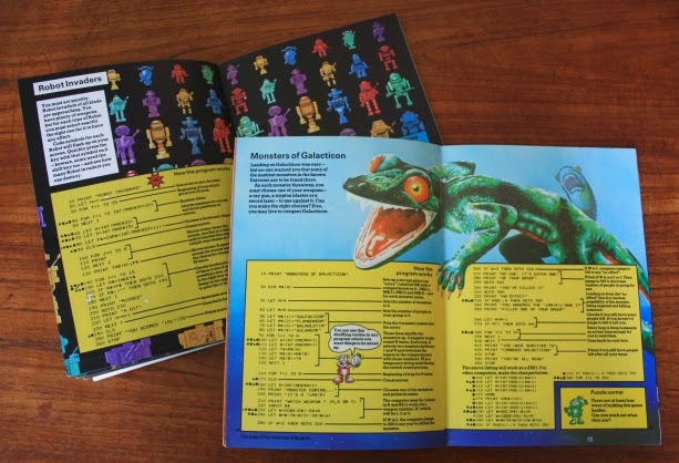 a photo of two programming books from the 80s, with a green monster jumping over the listing in one