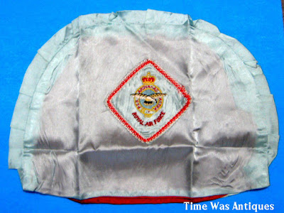 https://timewasantiques.net/products/royal-air-force-raf-wwii-silk-tea-cozy-england-vintage-1940s-unfinished