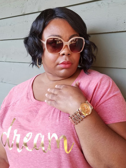 Curvy blogger in foil print dream tee, rose gold accessories, MK watch, blush sunglasses