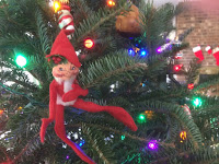 Christmas elf on the tree