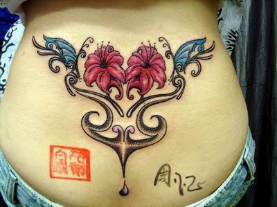 Butterfly Tattoo  on Girly Flower And Butterfly Tattoo Design On Lower Back