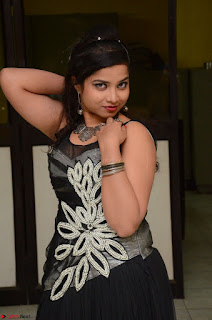 Shrisha Dasari in Sleeveless Short Black Dress At Follow Follow U Audio Launch 039.JPG