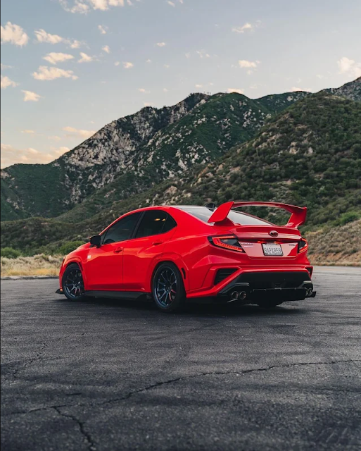 2022 Subaru WRX with RED paint matched body cladding