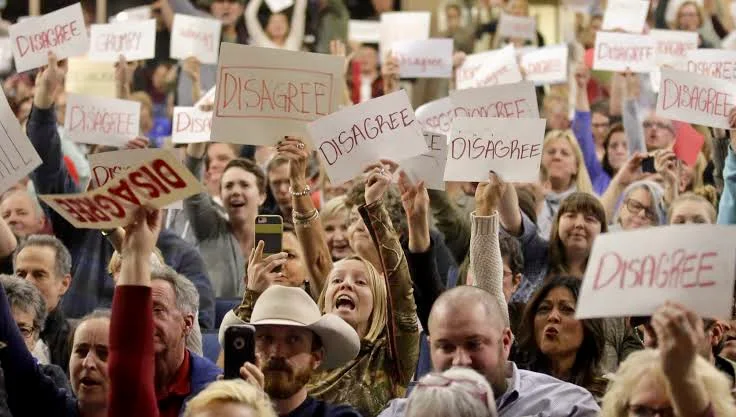 During the congressional recess Republicans prevent their members from attending live town hall meetings because of increasing hostility from their home district constituents.