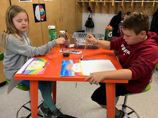 students painting