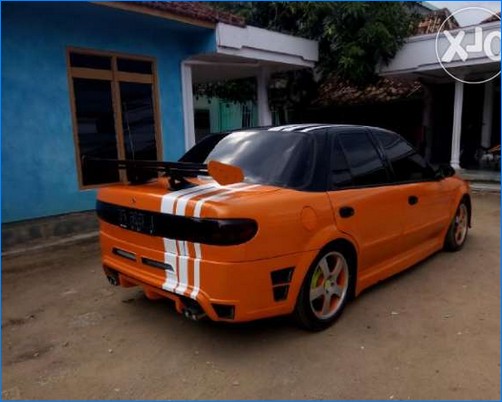 10 Gambar modifikasi  mobil sedan  timor dohc elegan  ceper 