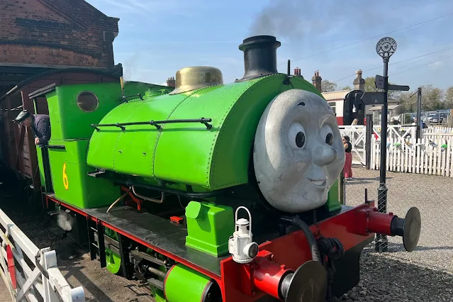 Close up of Percy a green steam engine at day out with thomas