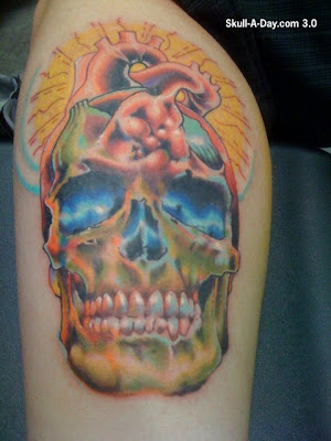  tattoo of a skull/heart at the seattle tattoo expo this august and 