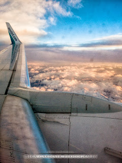 Airplane window seat photography by Chris Gardiner www.cgardiner.ca who tends to fly westjet a lot