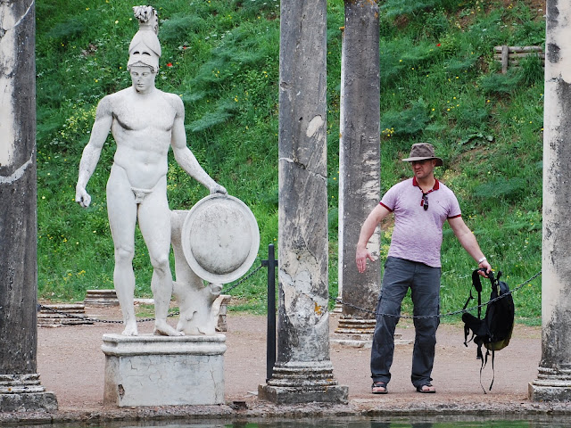 Statues by the formal pond at villa adriana