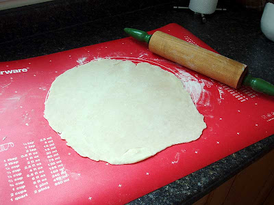 Here I'm using my favourite rolling pin, her name is Mrs. Godkin, to roll out the dough.