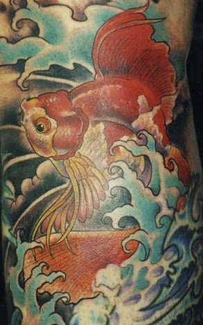 chinese goldfish tattoo. 2010 goldfish tattoo meaning.