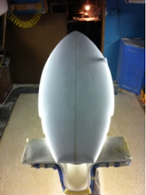 this is 2,38 thick by 20.25 wide. With two wings to bring the tail in. Custom and available in all shapes and sizes.