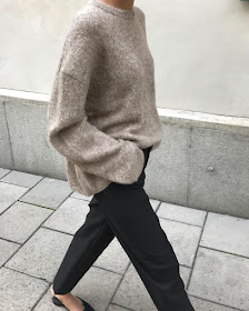 Easy Minimalist Instagram Outfit Idea: Neutral Oversized Sweater, Black Pants, and Mule Flats