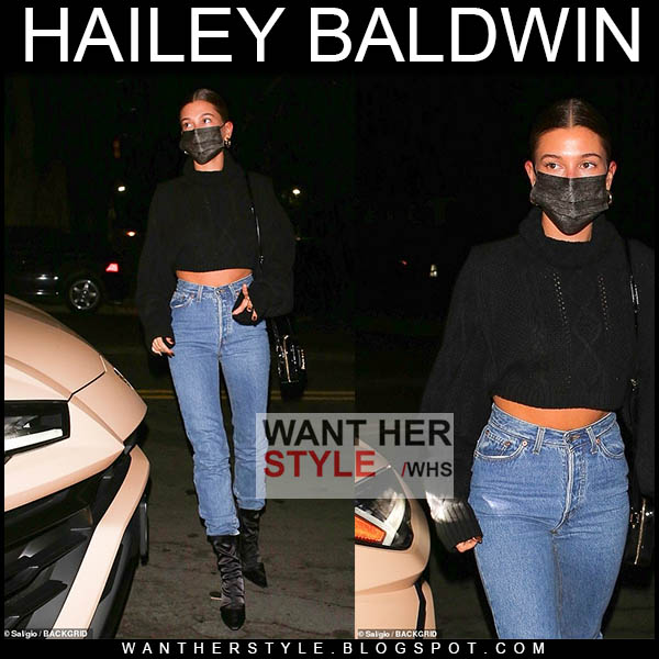 Hailey Baldwin in black cropped sweater and jeans