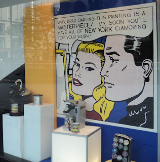 Roy Lichetenstein inspired window display at Hancock Building Best Buy 