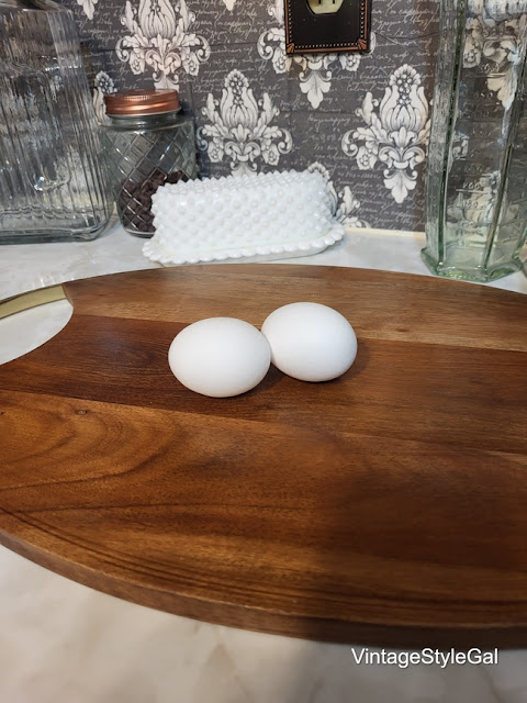 2 eggs on cutting board