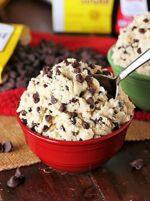 Bowl of Edible Chocolate Chip Cookie Dough with a Spoon Image