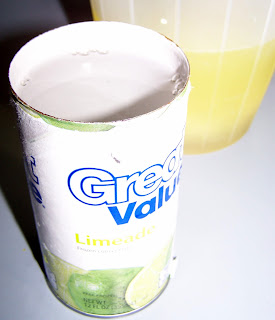 Can of frozen limeade opened and filled with clear tequila