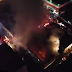 Colapso de techo de edificio incendiado en La Vega deja tres bomberos muertos