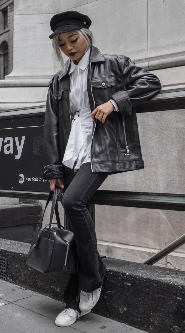 street style addict / oversized leather jacket + bag + hat + jeans + white top + sneakers