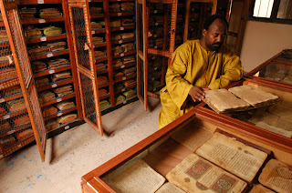 Malian librarian reading