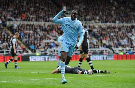 Manchester City midfielder Yaya Touré celebrates after scoring his second goal against Newcastle