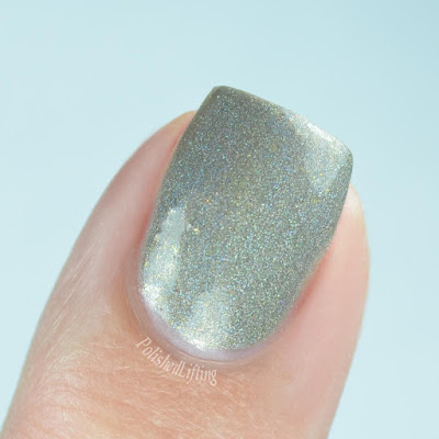gray holo single nail close up