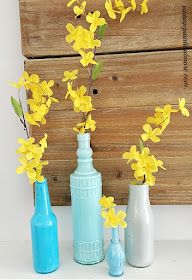 Vintage Paint and more... diy painted blue bottles with faux forsythia stems for a spring mantel