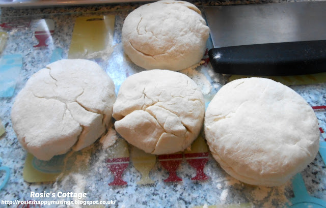 Easiest Ever, Yummiest, Two ingredient Bread 🥖🍞 Place your dough onto a floured surface and cut into quarters.