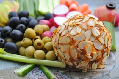 http://vedgedout.com/2013/11/15/kick-ace-extra-sharp-raw-vegan-holiday-cheddar-cheese-ball-virtual-vegan-potluck-edition/