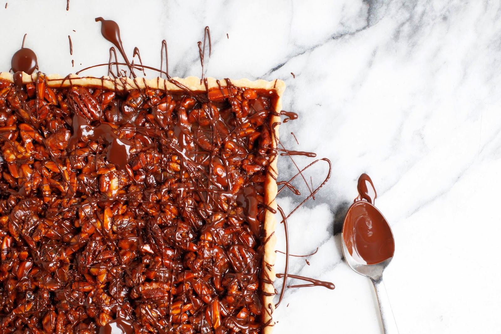 http://food52.com/recipes/32584-caramel-nut-tart-with-chocolate