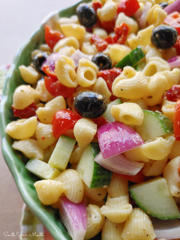 Overnight Pasta Salad | Absolutely THE BEST pasta salad recipe made by mixing hot, cooked pasta with prepared Italian dressing AND dry Italian dressing seasoning mix to marinate overnight.