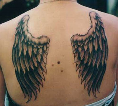 angel wing tattoos on back. tattoo on ack wings. angel