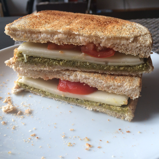 Vegan tomato and pesto cheese grill sandwich