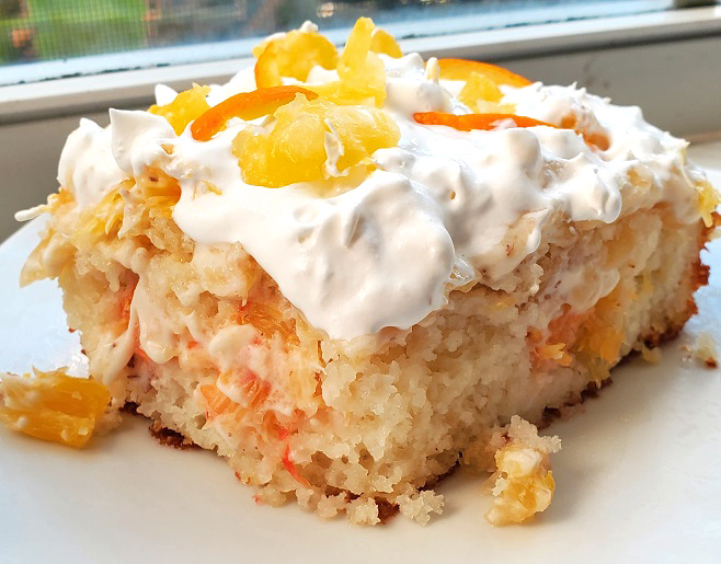 this is an orange pineapple doctored cake mix cake