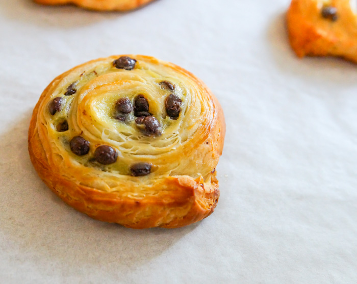 one Trader Joe's Mini Croissant Swirl Chocolate Chip, baked on cookie sheet