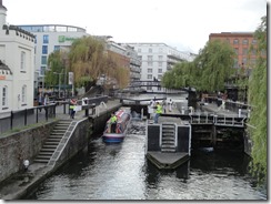 Watching a boat waiting on the doors to close the lock to go upstream in Camden Town