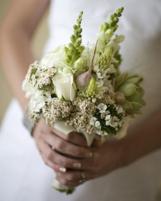 The delicate bridal bouquet The bride's bouquet has some white roses and