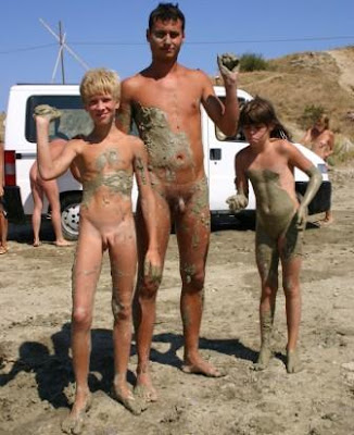 Family Nudism On Camping Playing In The Mud With The Family Camp