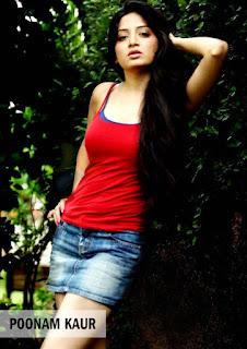 poonamkaur in red top and blue short, posing in garden