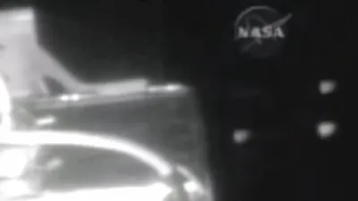 A closer look at the UFOs flying past the ISS.