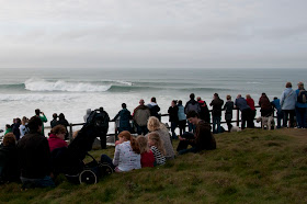 Crowds watch giant waves in Newquay Cornwall