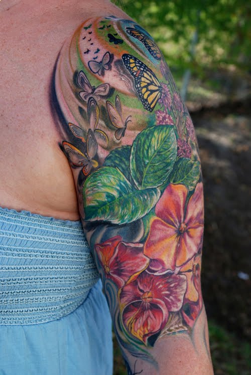 full sleeve butterfly and flowers tattoo
