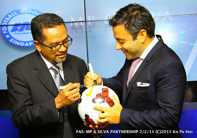 Signing on the ball to signify a new partnership